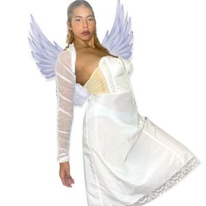 1950s white under dress/dress, zippers through the center of chest.